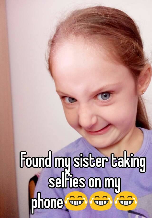 Taking selfies of (not) my sister.